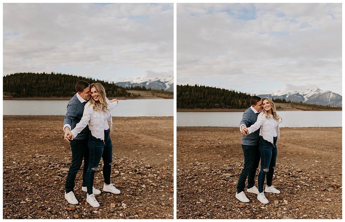 couple holds arms together outstretched during Colorado engagement session