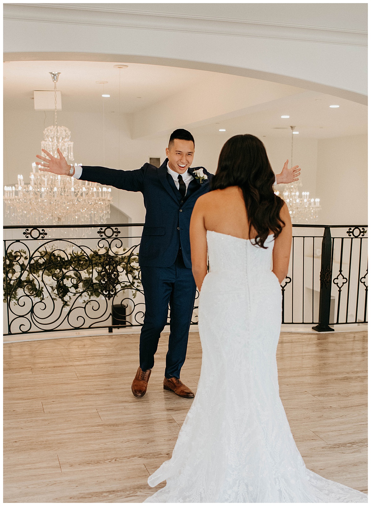 man holds arms out to woman walking toward him during first look by Texas wedding photographer