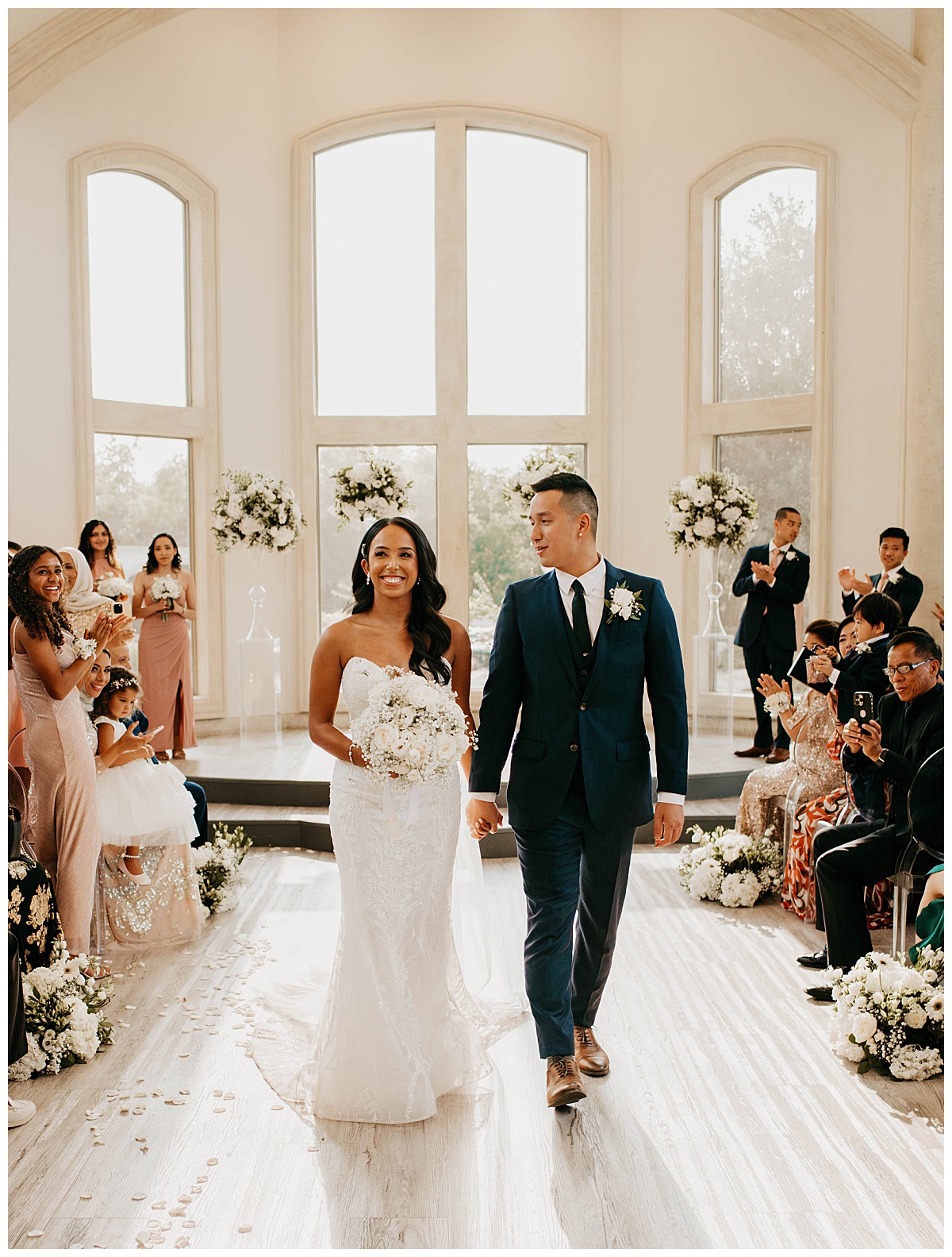 couple walks back down the aisle after exchanging vows by Stephanie J. Zamora Photography