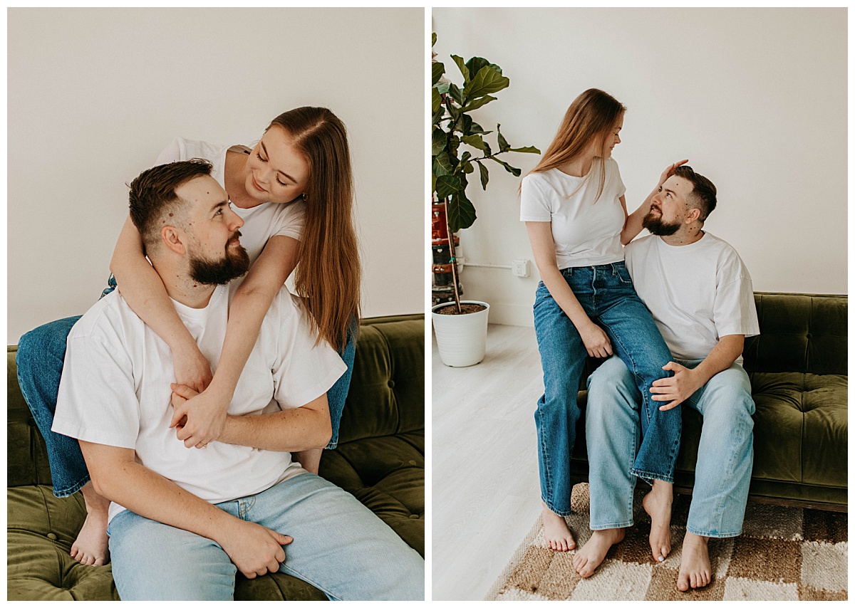 fiances sit together on green couch by Stephanie J Zamora Photography