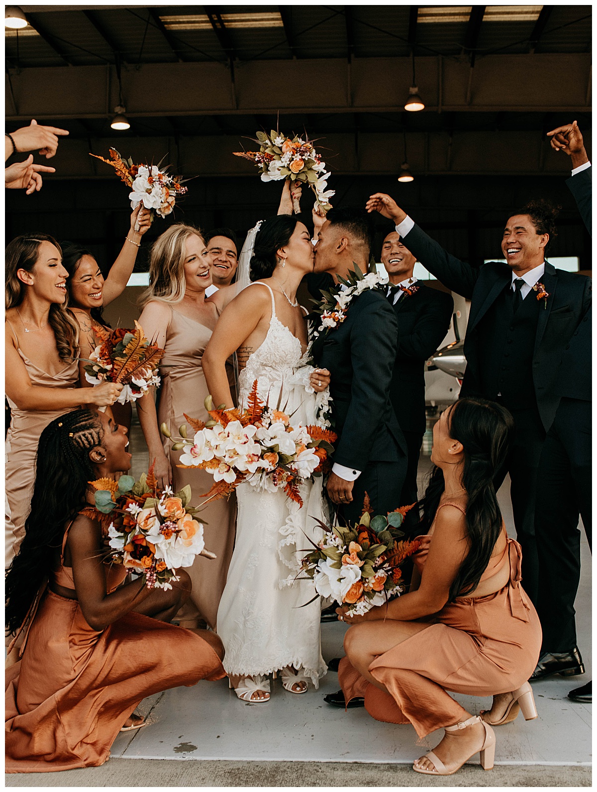 wedding party gathers around couple at Long Beach ceremony 