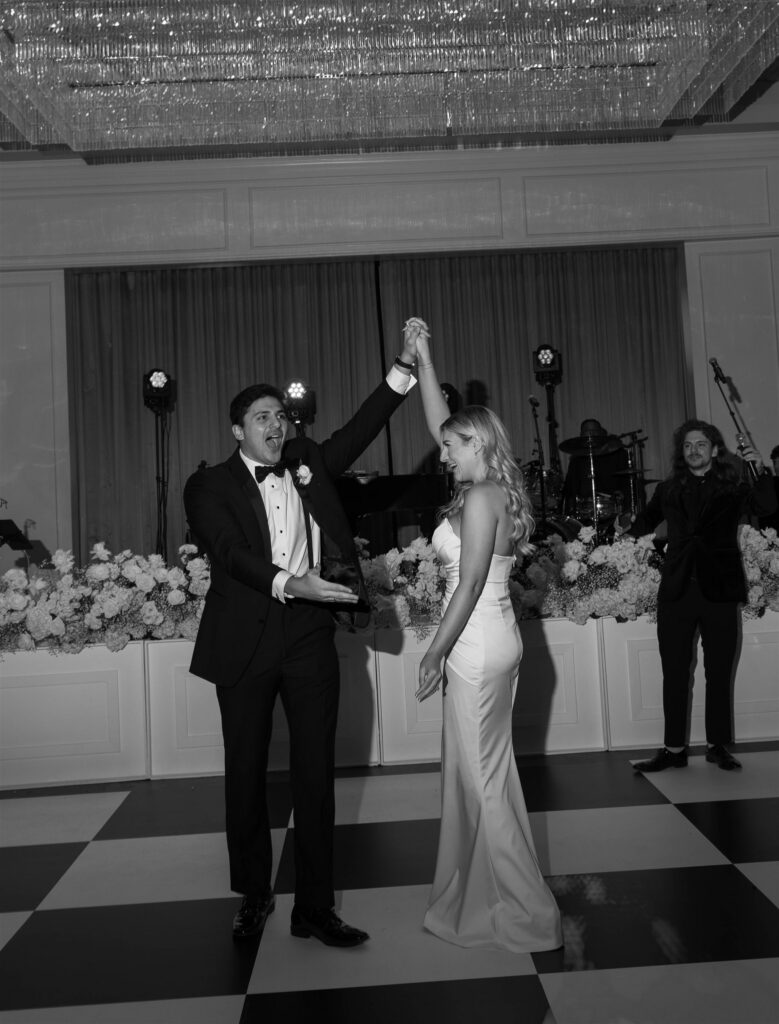 dancing and reception party photos from wedding at sandlewood manor in houston, texas