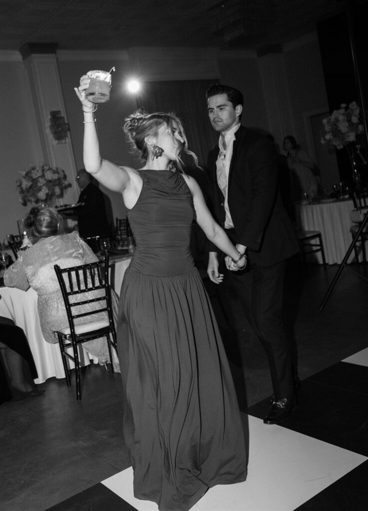 dancing and reception party photos from wedding at sandlewood manor in houston, texas